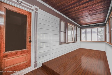 Welcome to 201 Van Name Avenue - a beautifully renovated - photo 3