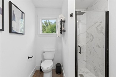 Discover refined coastal living in this beautifully renovated - photo 45