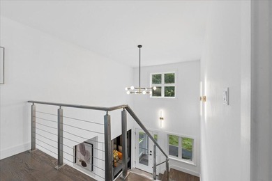 Discover refined coastal living in this beautifully renovated - photo 48