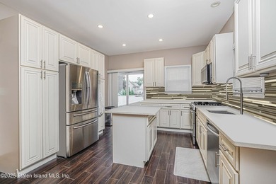 Welcome to 201 Van Name Avenue - a beautifully renovated - photo 8