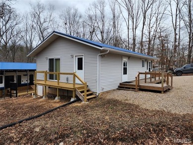 Check out this new build, custom,  two bedroom,  lake home