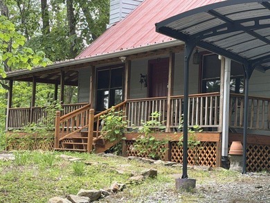 This tastefully updated two bedroom , two bath cabin is located - photo 3