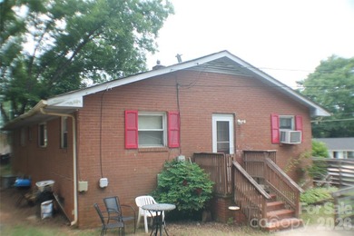 Discover a Rare Diamond in the Rough in Davidson, NC! Nestled on - photo 3