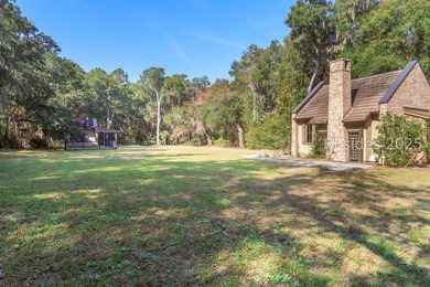 Surrounded by majestic Live Oaks and overlooking the 12th - photo 1
