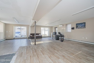 Welcome to 2981 Hylan Boulevard, a truly unique opportunity - photo 4