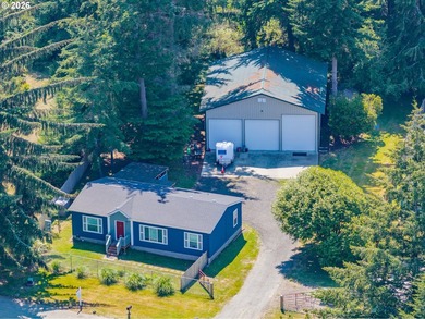 Coastal Oregon living at its best! Nestled just minutes from the - photo 1