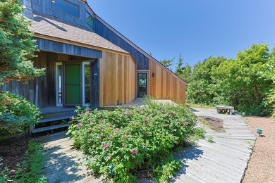 Rising above the shoreline is this Truro retreat, a stunning 4BD - photo 3