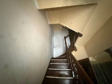 RESERVE ONLINE AUCTION-Vacant 3-family dwelling being sold - photo 8