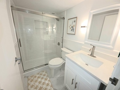 Exquisitely renovated corner residence offering 1,129 sq ft of