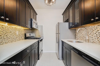 NO NEED TO RENT WHEN YOU CAN OWN THIS STUNNING LUXURY CONDO - photo 9