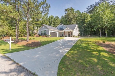 Come home to 1111 Bay Drive in Treasure Bay, a like-new 2023 - photo 2