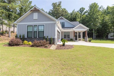 Come home to 1111 Bay Drive in Treasure Bay, a like-new 2023 - photo 3