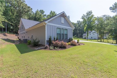 Come home to 1111 Bay Drive in Treasure Bay, a like-new 2023 - photo 5
