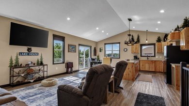 Enjoy lakefront living in this 4-bedroom, 3-bath home on scenic - photo 2