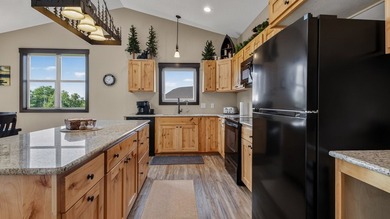 Enjoy lakefront living in this 4-bedroom, 3-bath home on scenic - photo 7