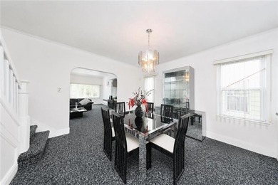 Welcome to this semi-attached two-family home located in the - photo 8