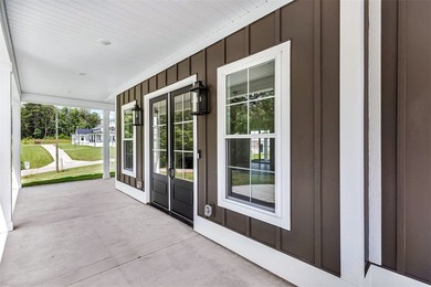 Craftsman-style 4-bedroom home featuring an attached side-entry - photo 2