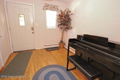 Excellent opportunity to own a 2-family semi-attached home in a - photo 3