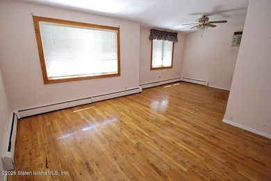 Excellent opportunity to own a 2-family semi-attached home in a - photo 5