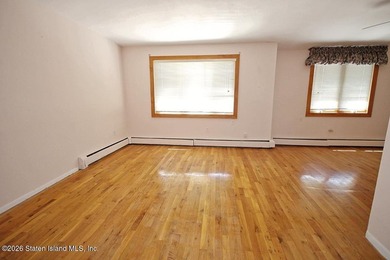 Excellent opportunity to own a 2-family semi-attached home in a - photo 6
