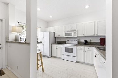 Beautiful two-story corner townhouse offering two bedrooms and - photo 6