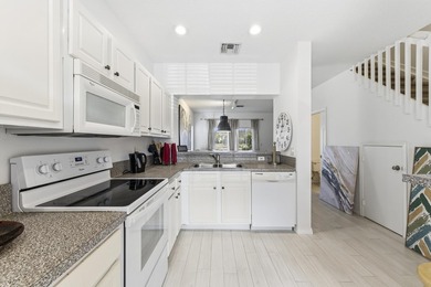 Beautiful two-story corner townhouse offering two bedrooms and - photo 8