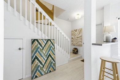 Beautiful two-story corner townhouse offering two bedrooms and - photo 9