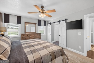 Nestled in a charming 8-home community, this well-maintained - photo 16