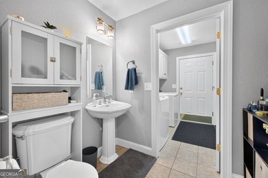 Nestled in a charming 8-home community, this well-maintained - photo 22