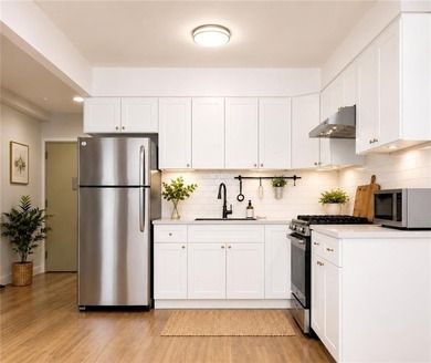 Welcome to this beautifully maintained, move-in ready condo in - photo 3
