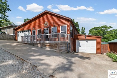 Experience the rustic charm of this log-sided home with stunning - photo 1