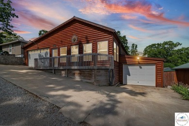 Experience the rustic charm of this log-sided home with stunning - photo 2