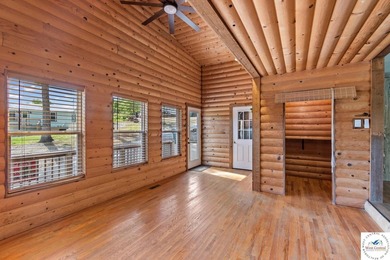 Experience the rustic charm of this log-sided home with stunning - photo 3