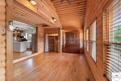 Experience the rustic charm of this log-sided home with stunning - photo 4