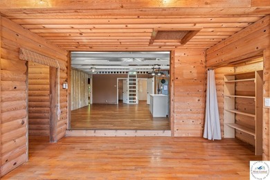 Experience the rustic charm of this log-sided home with stunning - photo 6