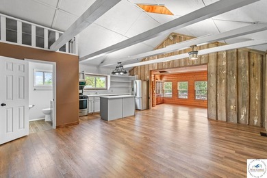 Experience the rustic charm of this log-sided home with stunning - photo 8