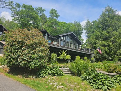 This totally renovated mountain retreat is a perfect blend of - photo 1