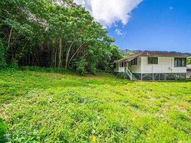 Tucked into the lush, tropical setting of Manoa Valley, this - photo 21