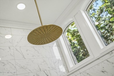 Offered for the first time, this custom-built home is nestled on - photo 41