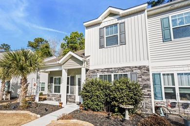 An exceptionally maintained 3-bedroom, 2.5 bath, end unit - photo 3