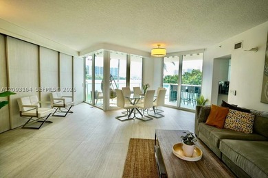 Located in the prestigious Hidden Bay Condo, this stunning - photo 3