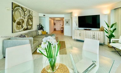 Located in the prestigious Hidden Bay Condo, this stunning - photo 6