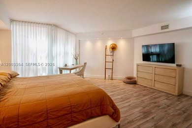 Located in the prestigious Hidden Bay Condo, this stunning - photo 8