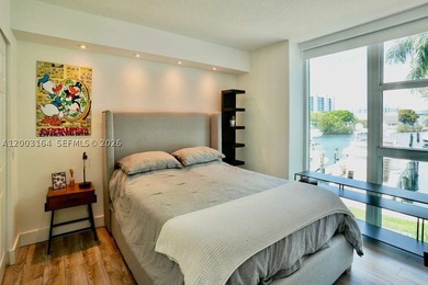 Located in the prestigious Hidden Bay Condo, this stunning - photo 9