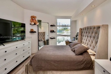 Located in the prestigious Hidden Bay Condo, this stunning - photo 10