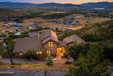 Perched high in Midway's sought-after Interlaken community, this - photo 1