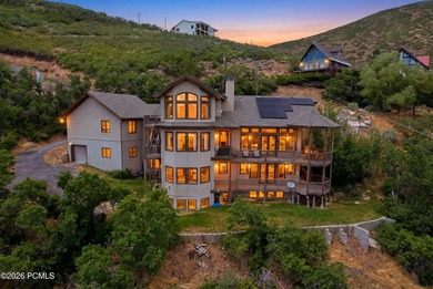 Perched high in Midway's sought-after Interlaken community, this - photo 2