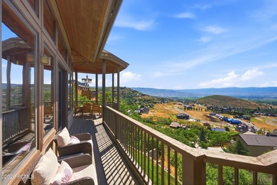 Perched high in Midway's sought-after Interlaken community, this - photo 6
