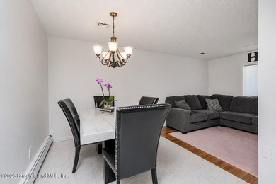 Welcome to 323 Main Street, a brick ranch set in the heart of - photo 9