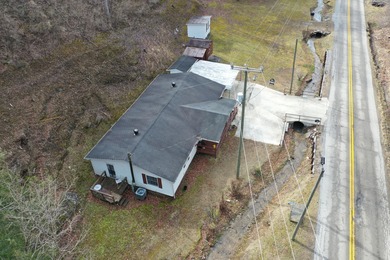 75 acres with a well maintained 3 Bedroom 2 Bath manufactured